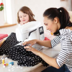 Woman Sewing with the Opal 690Q
